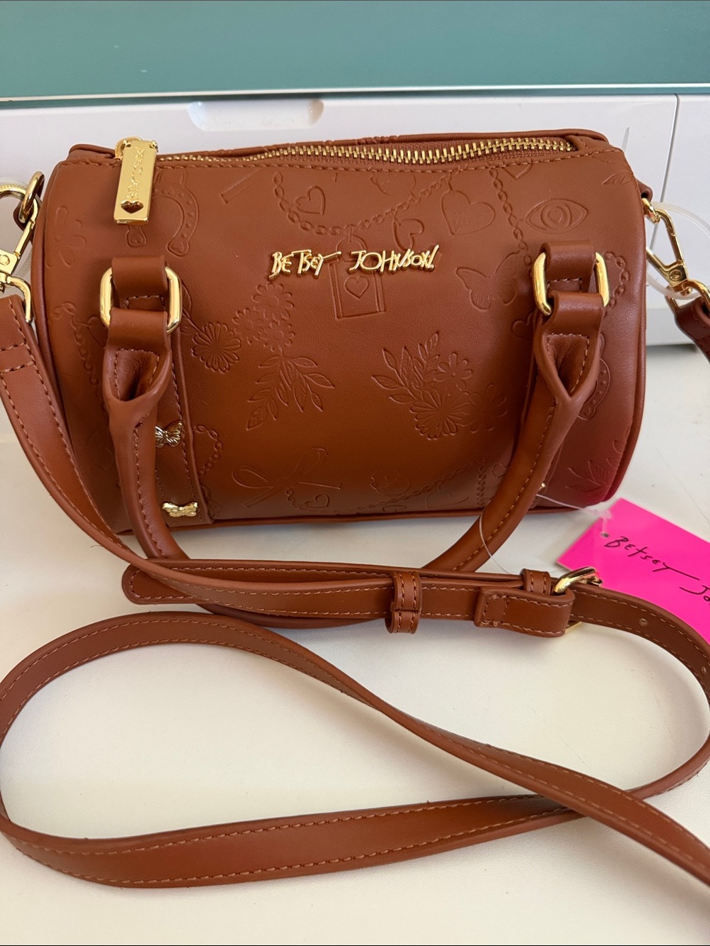 Betsey Johnson Tan Embossed Barrel Crossbody Bag